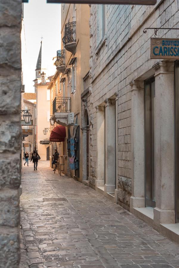 Quiet stone street in Budva Old Town beside R Club Apartments