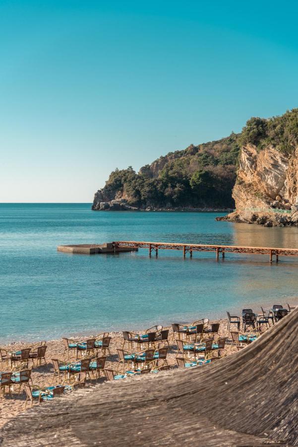 Adriatic beach and dock steps from R Club Apartments Budva