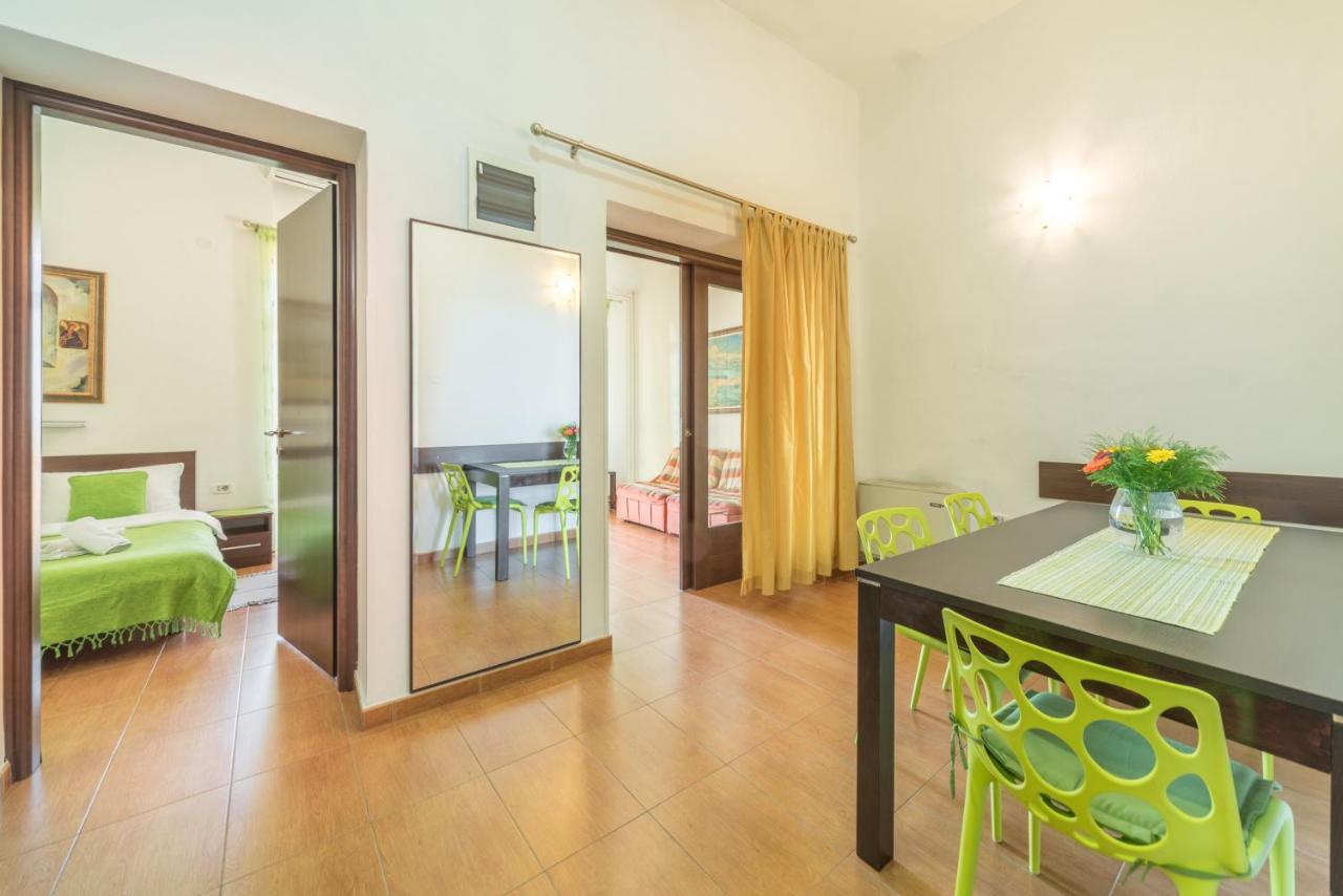 Seating and dining area in the Apartment with Balcony at R Club Apartments